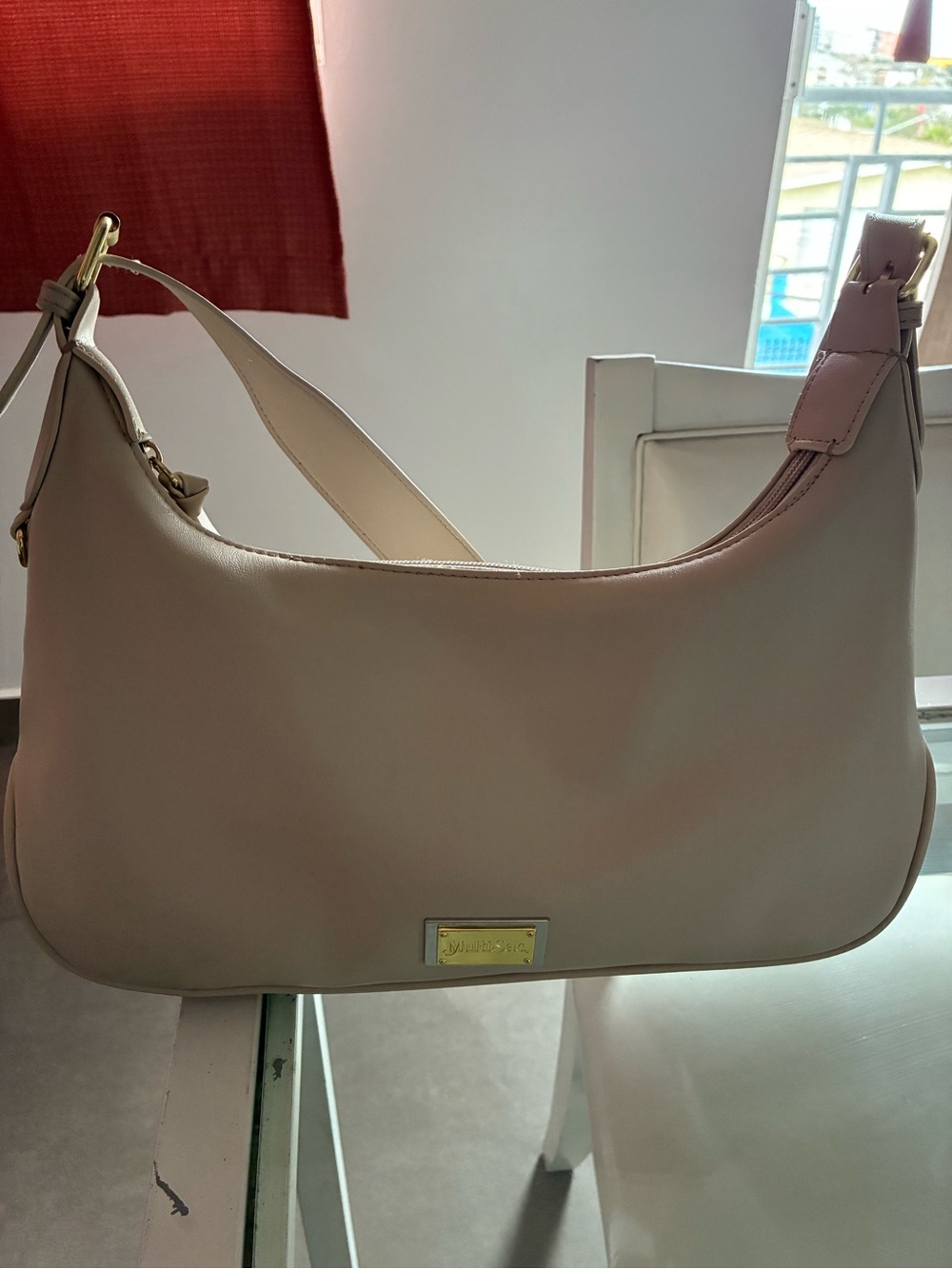 Elegant Cream Shoulder Bag with Gold Accent